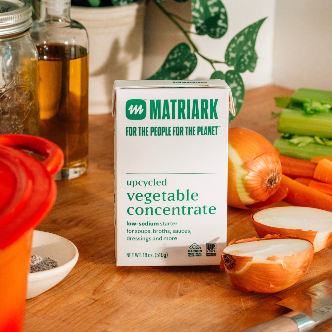 Matriark's Upcycled Vegetable Concentrate sitting on a countertop.