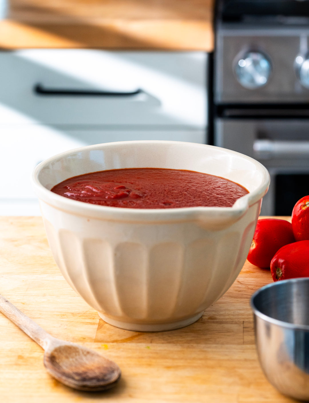 Matriark's Tomato Passata in a bowl sitting on a countertop.